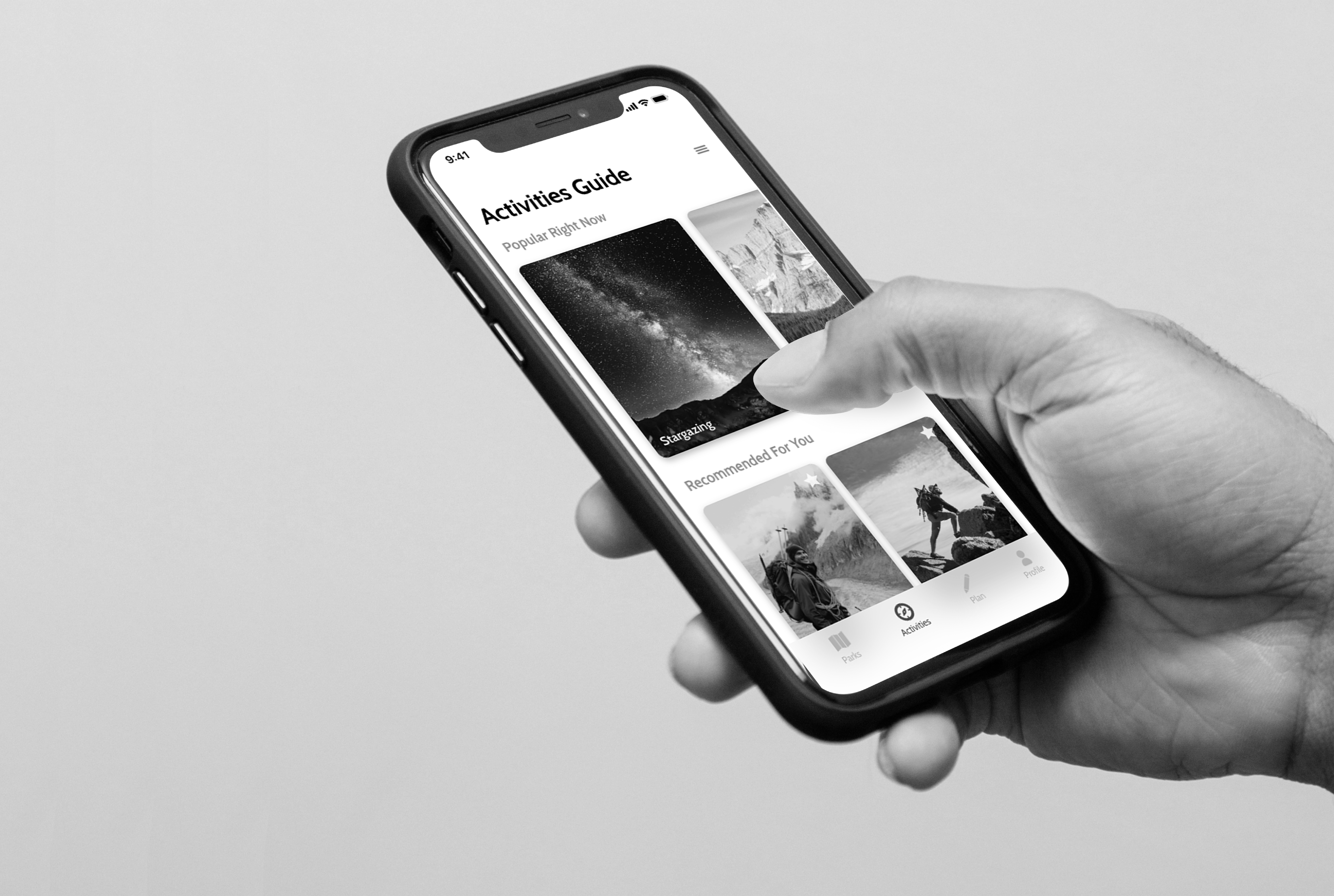 hand holding phone showing new design for national park app